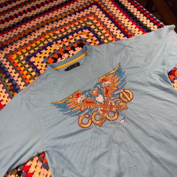 Vintage COOGI T-Shirt โ Blue โ Embroidered Eagle Sword Graphic โ Size Large - Picture 5 of 8